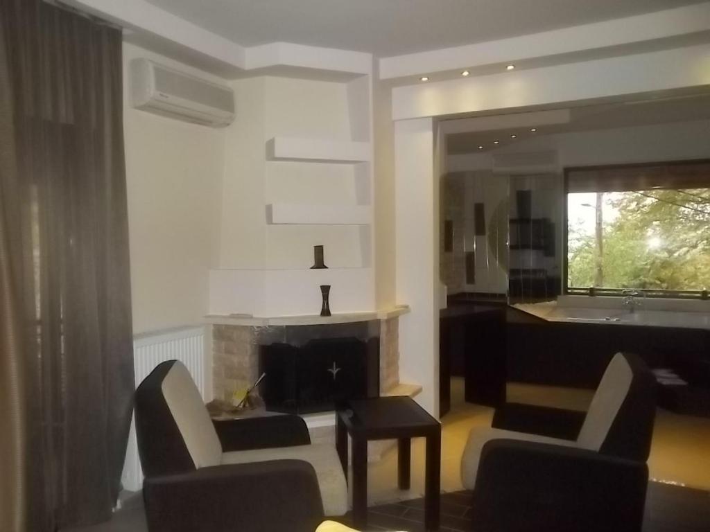 Nostos Hotel Káto Loutrákion Rum bild